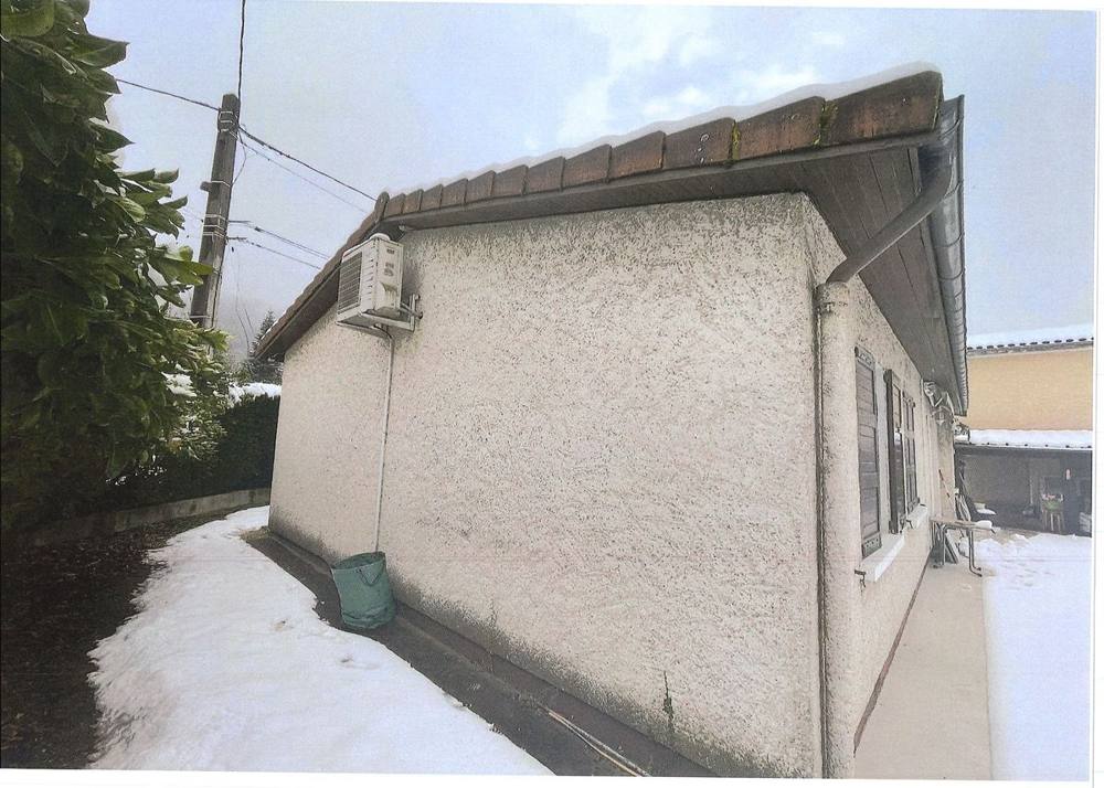 Maison de plain-pied avant isolation, côté jardin